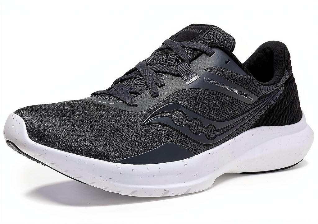 Saucony cross-training shoes in Black/White color on a gym floor